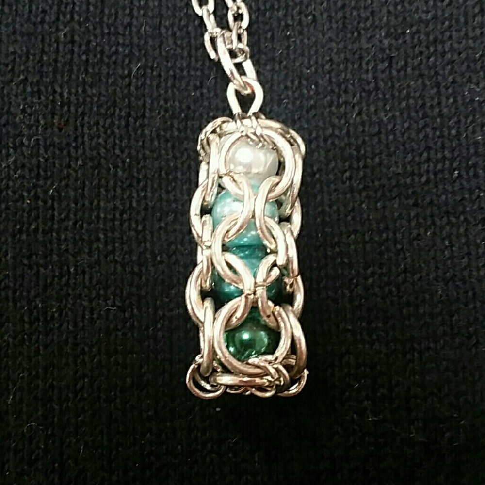 🎉🎉10/$25 Handcrafted Beads in a Cage necklace varigated